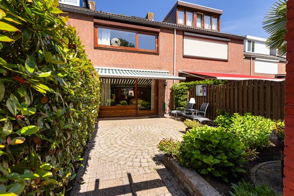 Foto - Te koop: Goed onderhouden tussenwoning in rustige woonwijk!